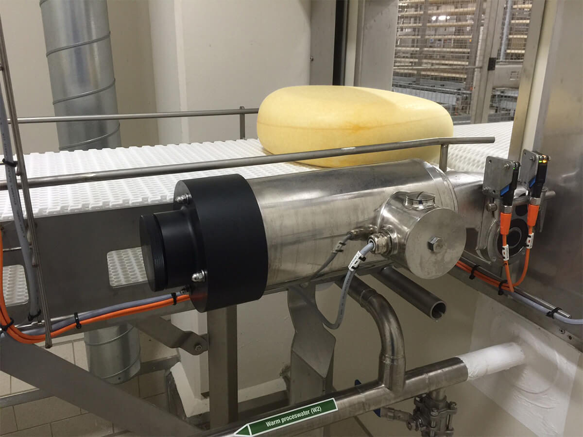 nastro trasportatore in caseificio con motoriduttore di velocità ortogonale autofrenante in acciaio inox